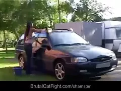Rough catfight at a carwash
